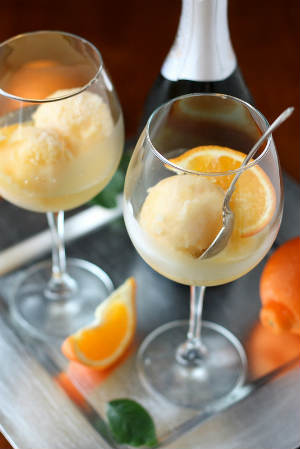 http://www.completelydelicious.com/2012/12/tangerine-sorbet-champagne-floats.html
